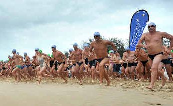 Competitors head for the water at the start of the Beachside Radiology Ocean Swim around the Coffs Harbour Jetty foreshores. Competitors head for the water at the start of the Beachside Radiology Ocean Swim around the Coffs Harbour Jetty foreshores.